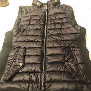 Polished, figure flattering light puff vest